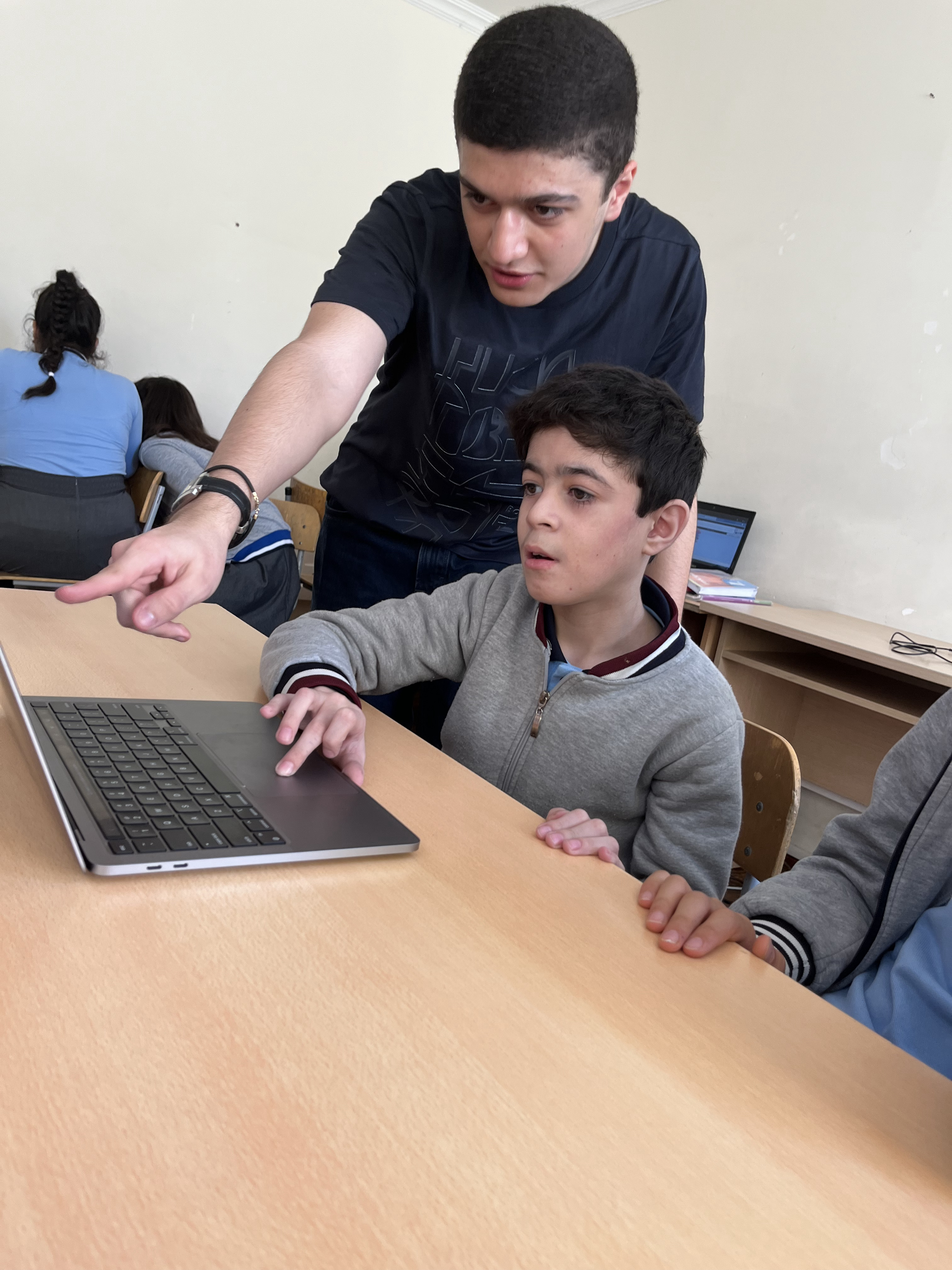 A student helping a child